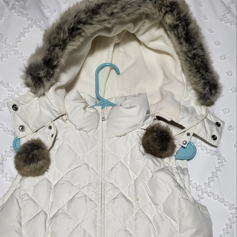Puffer vest with detachable fur lined hood